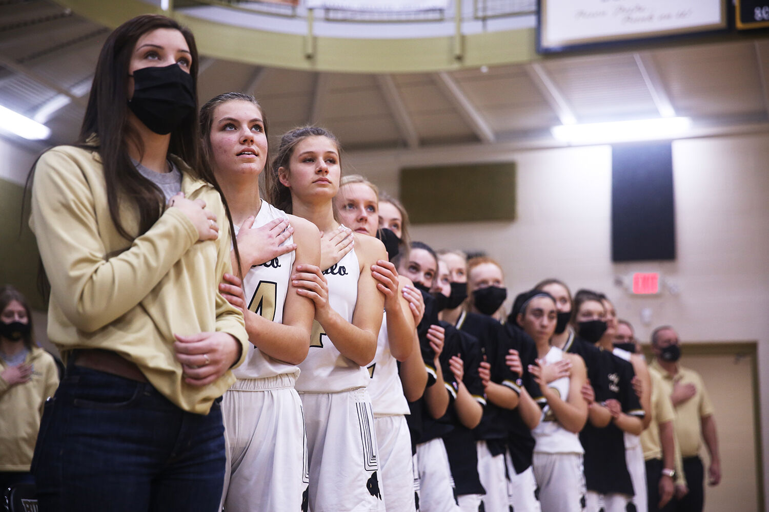 Buffalo High School's varsity girls team stands linked together